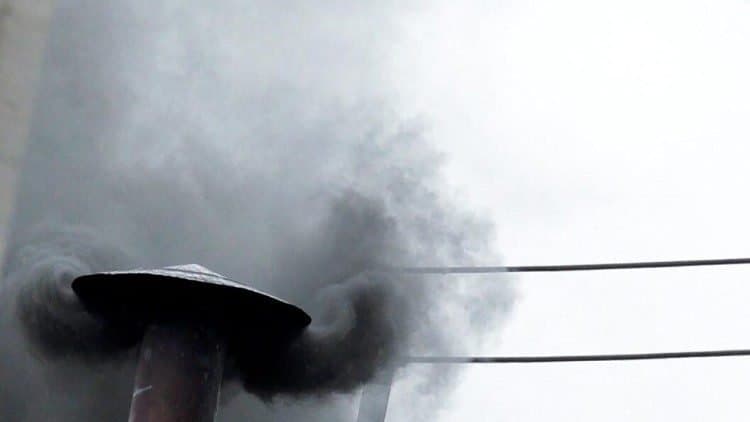 Black smoke signals end of first day of conclave to elect new pope